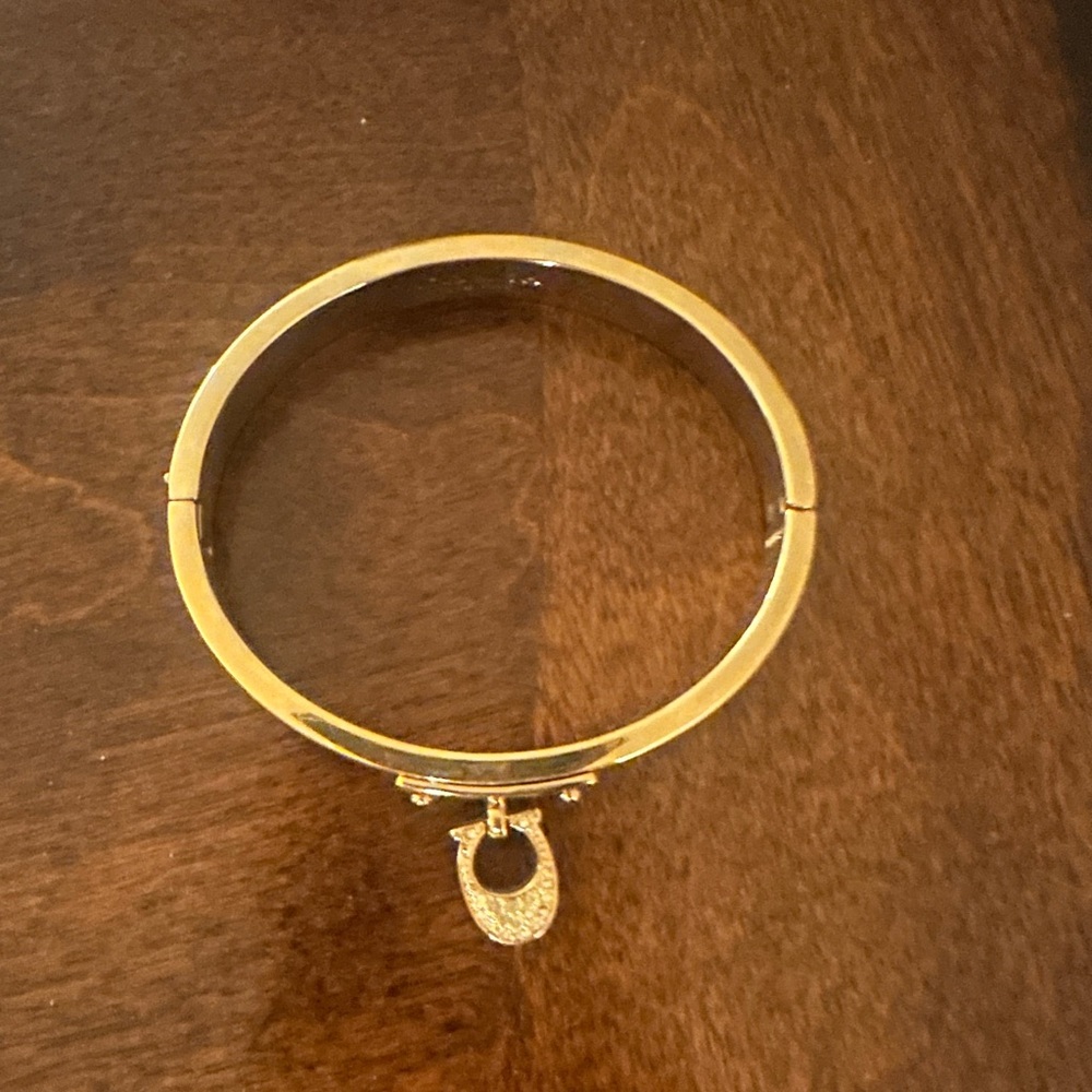Elegant Coach Bracelet with Charm